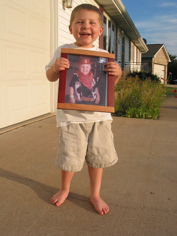 Connor celebrated being done with the intense treatments, holding a picture from when he was going through the heart of those treatments.