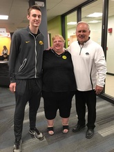 From left, Nicholas Baer, Stacy Ervin, and Dr. Mitch Kelly stand for a photo
