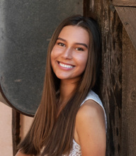 woman smiling towards camera