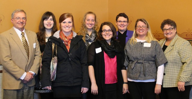L-R (back) Gary Curtis, Carrie Neihaus, Haylie Miller and Rep. Vicki Lensing. Front row: Megan Snyder, Katelyn McAdam, Carol Klose Smith (school counseling faculty), and Rep. Mary Mascher. 