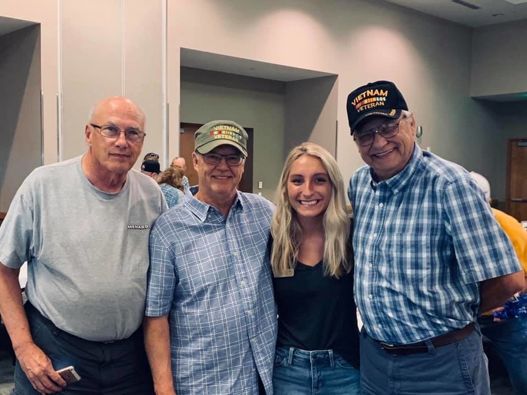 Regan Weber enjoys spending time with veterans during an Honor Flight activity.