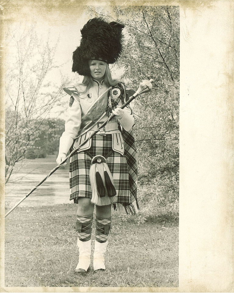 Bettina Hass poses in her Scottish Highlanders kilt as Drum Major in an archived photo from 1974.