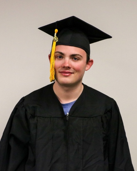 Elliot Murray wearing a cap and gown