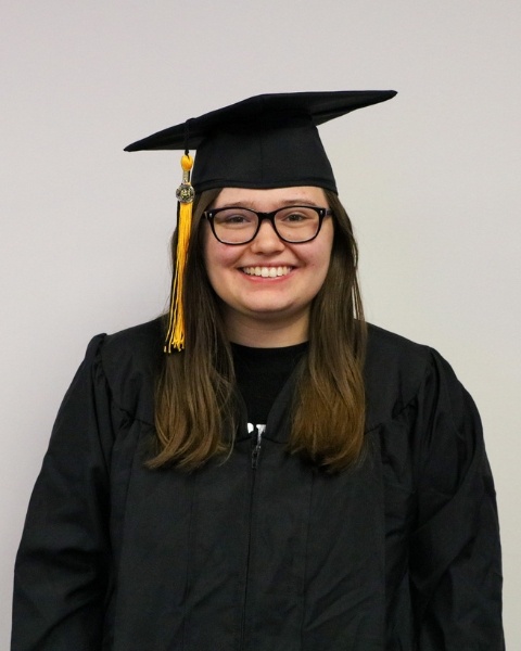 Kenady Weaver wearing a cap and gown
