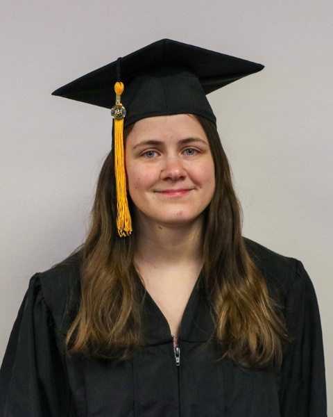 Zoe Graham wearing a cap and gown