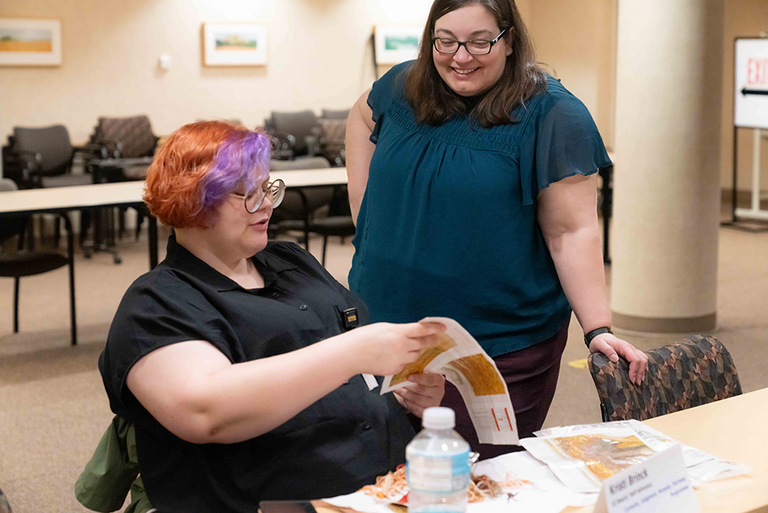 A UI REACH student at her internship.