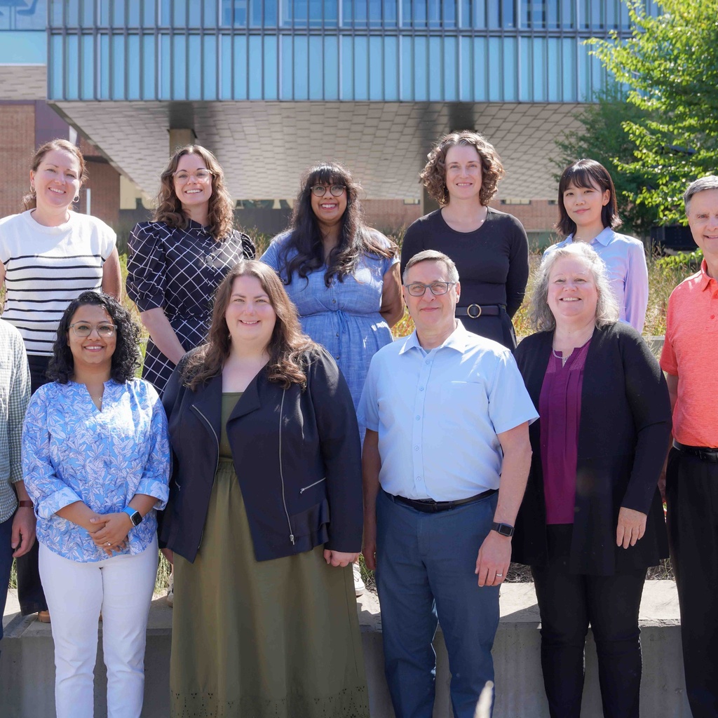 New faculty for the 2025-2026 academic year, standing in front of the engineering building
