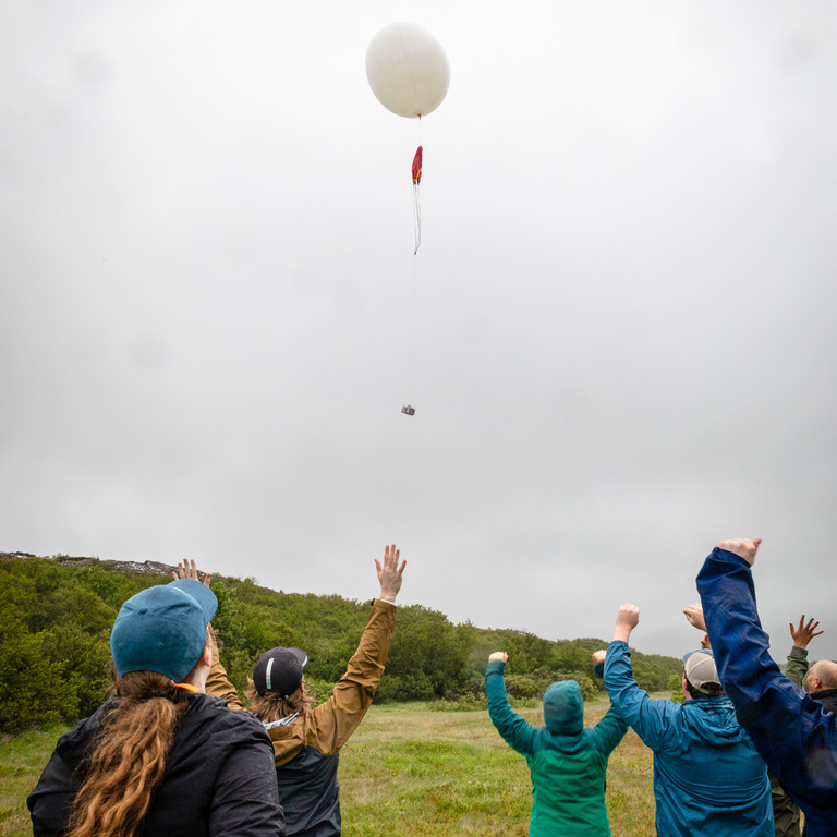 hands in the air, celebrating a successful launch 