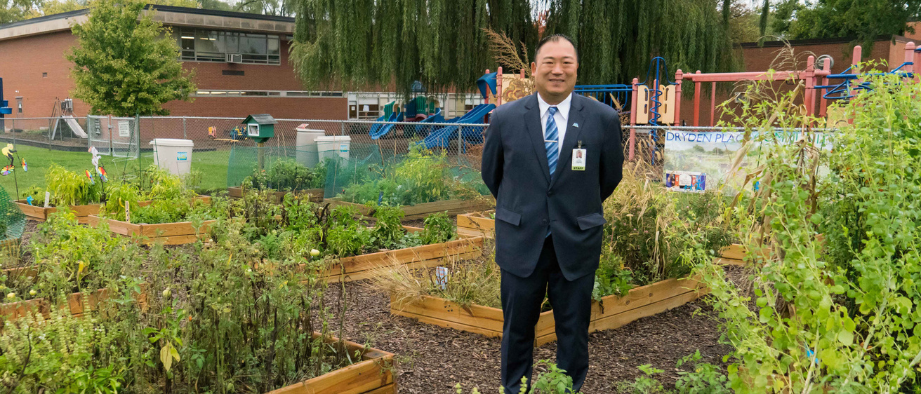 Jake Chung in a garden