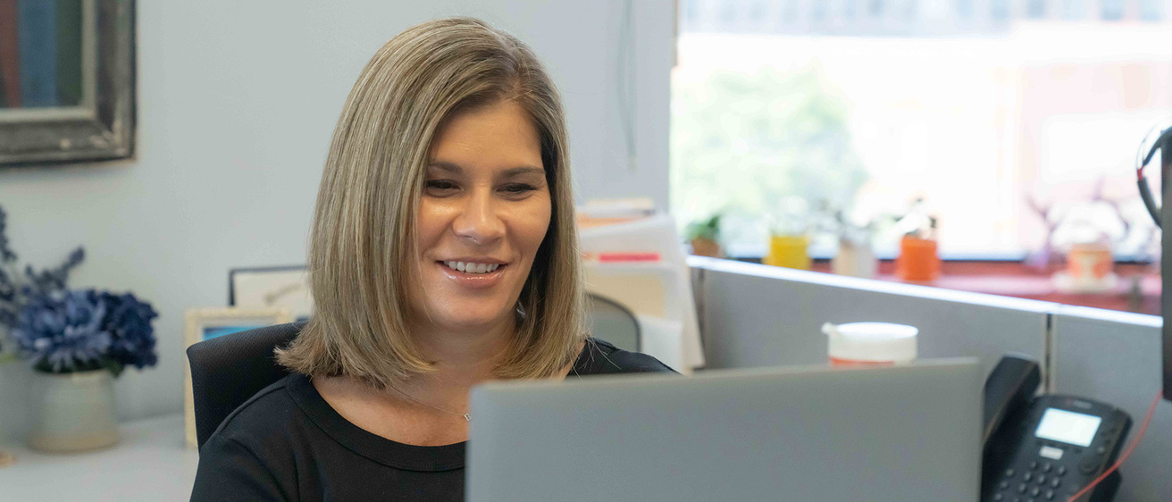 Adult working on a laptop