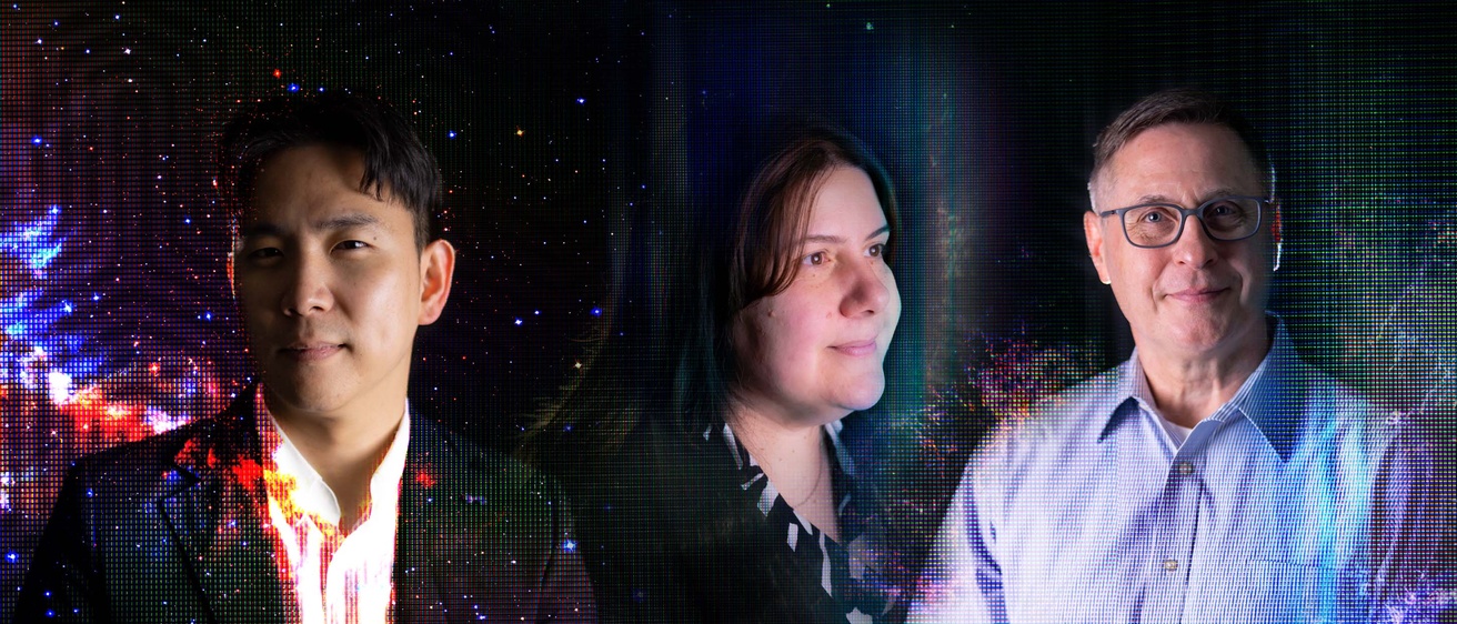 Two men and a woman appear surrounded by cosmic stardust and digital artifacts.