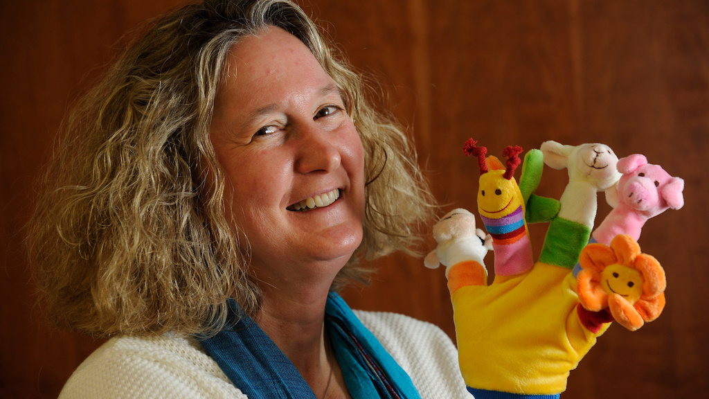 Art Education Faculty member, Clar Bladus, with finger puppets